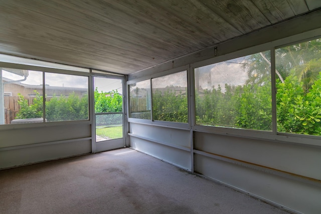 unfurnished sunroom featuring a healthy amount of sunlight