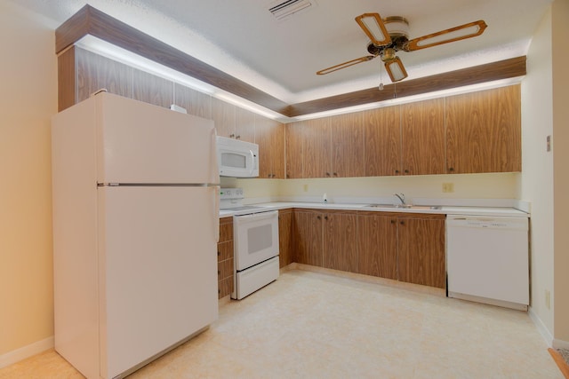 kitchen featuring light countertops, visible vents, ceiling fan, and white appliances