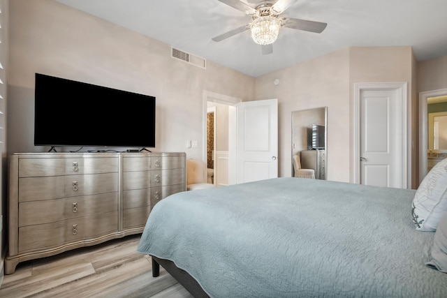 9900 S Ocean Dr Unit 1601, Jensen Beach, FL 34957 - bedroom with light wood-type flooring, visible vents, and ceiling fan