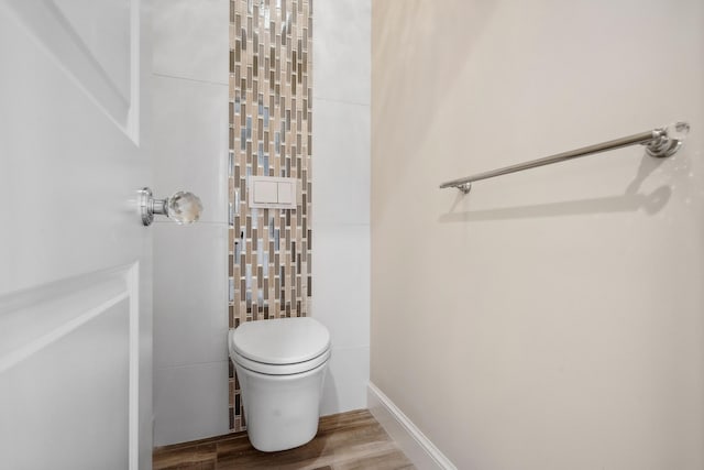 9900 S Ocean Dr Unit 1601, Jensen Beach, FL 34957 - bathroom featuring wood finished floors and toilet