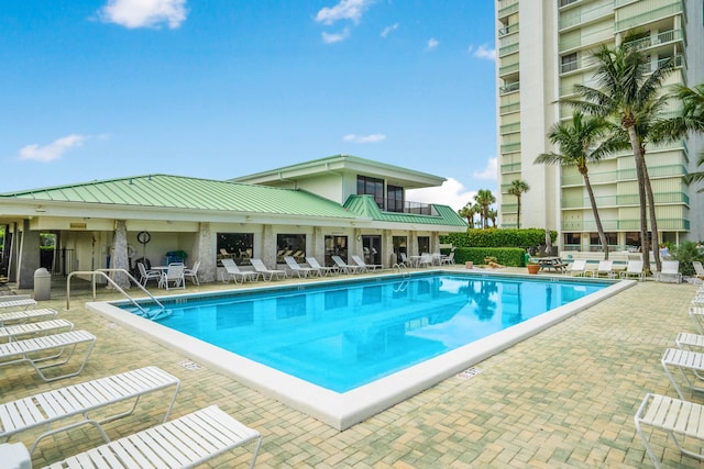 9900 S Ocean Dr Unit 1601, Jensen Beach, FL 34957 - pool featuring a patio