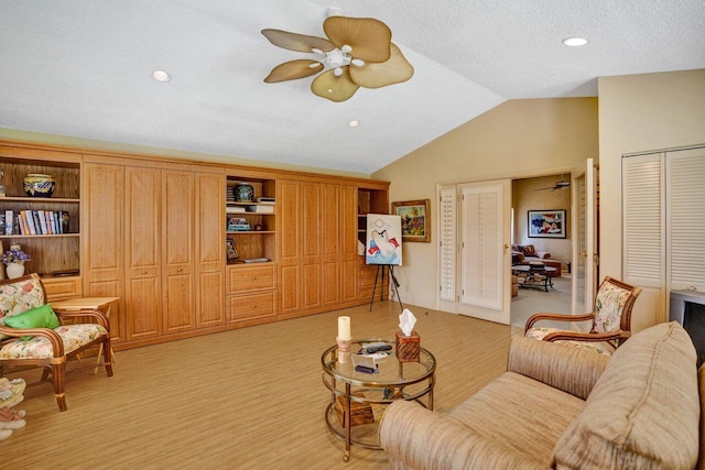 13179 Camero Way, Palm Beach Gardens, FL 33418 - living room featuring a ceiling fan, vaulted ceiling, recessed lighting, and light carpet