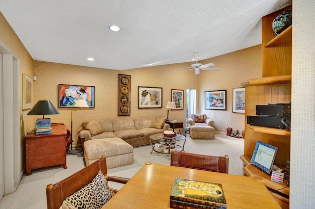 13179 Camero Way, Palm Beach Gardens, FL 33418 - living room with carpet, a ceiling fan, vaulted ceiling, a textured ceiling, and recessed lighting