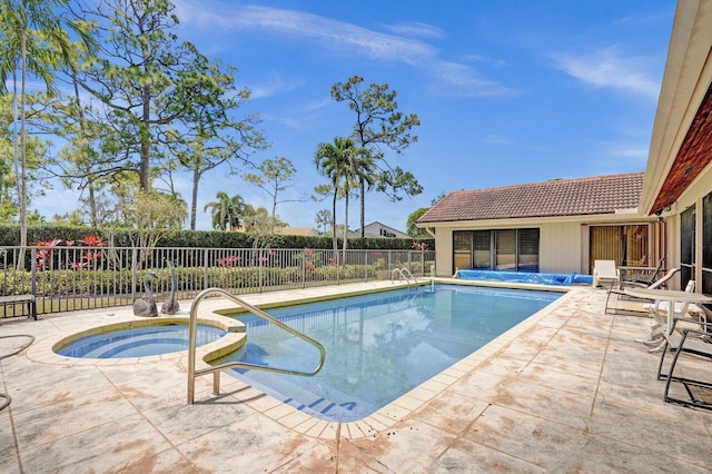13179 Camero Way, Palm Beach Gardens, FL 33418 - view of swimming pool with an in-ground hot tub and a patio
