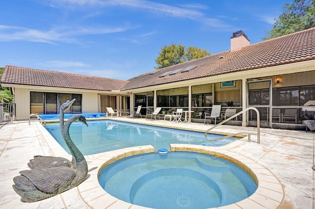 13179 Camero Way, Palm Beach Gardens, FL 33418 - view of swimming pool with a patio and a pool with connected hot tub
