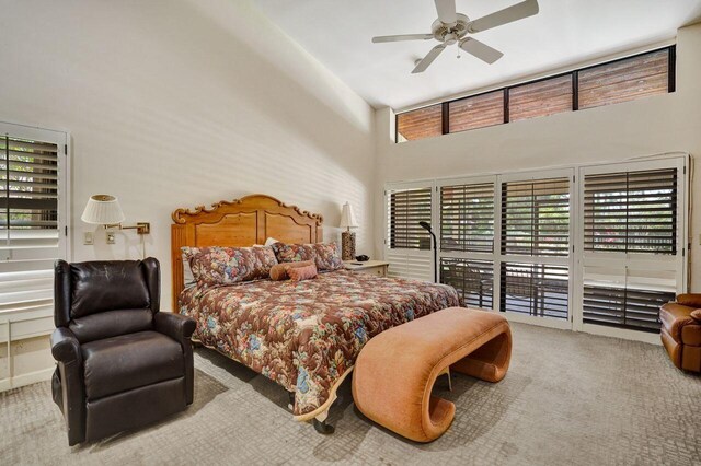 13179 Camero Way, Palm Beach Gardens, FL 33418 - bedroom featuring carpet floors, multiple windows, access to outside, a high ceiling, and a ceiling fan