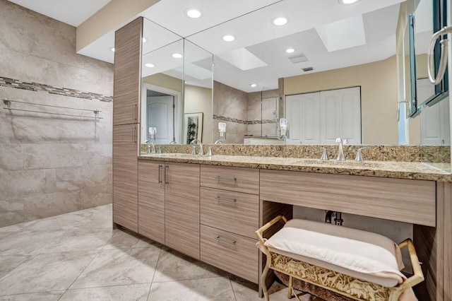 13179 Camero Way, Palm Beach Gardens, FL 33418 - bathroom with double vanity, walk in shower, and recessed lighting
