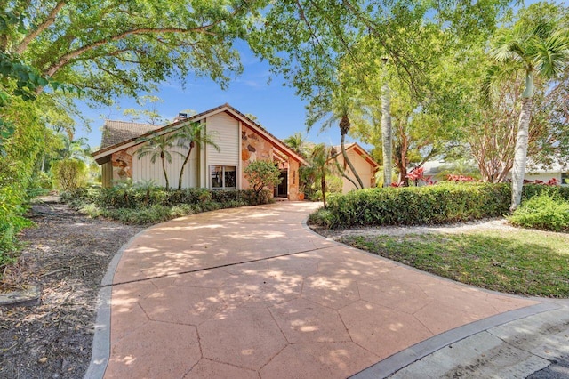 13179 Camero Way, Palm Beach Gardens, FL 33418 - view of front of property featuring driveway