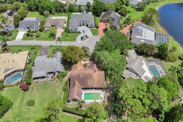13179 Camero Way, Palm Beach Gardens, FL 33418 - aerial view of property and surrounding area with nearby suburban area, a pool area, and a large body of water