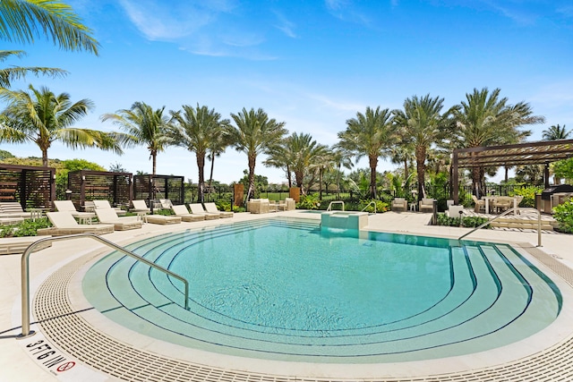 210 SE Mizner Blvd Unit 301, Boca Raton, FL 33432 - community pool featuring a pergola and a patio
