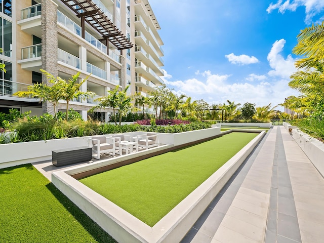210 SE Mizner Blvd Unit 301, Boca Raton, FL 33432 - view of home's community featuring a bocce ball area