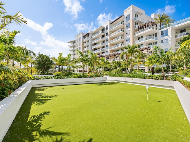 210 SE Mizner Blvd Unit 301, Boca Raton, FL 33432 - surrounding community with an area to practice putting