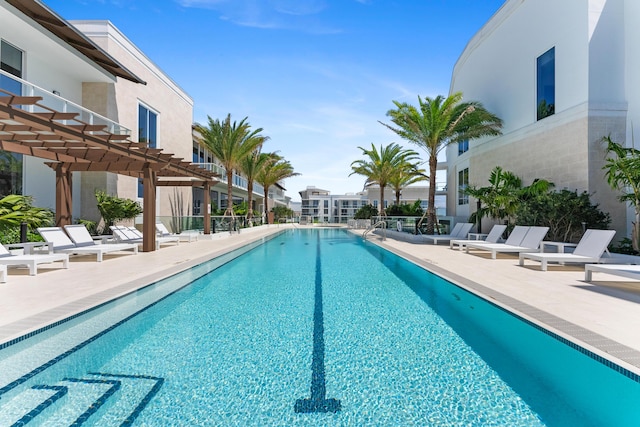 210 SE Mizner Blvd Unit 301, Boca Raton, FL 33432 - community pool featuring a pergola and a patio