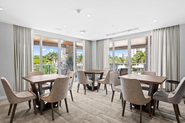 210 SE Mizner Blvd Unit 301, Boca Raton, FL 33432 - dining area featuring plenty of natural light