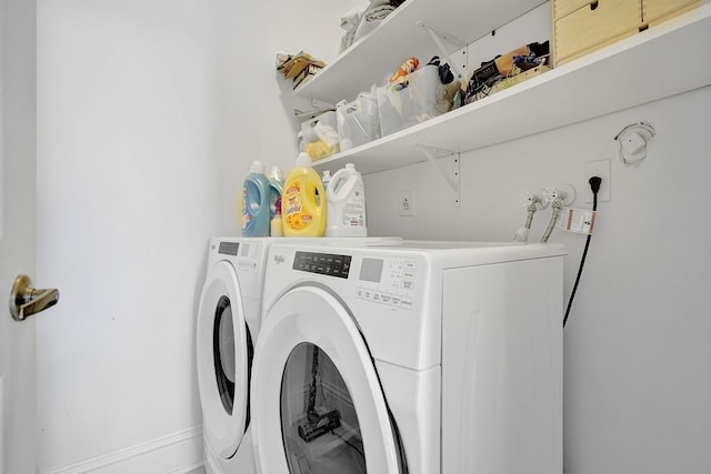 laundry area featuring independent washer and dryer and laundry area