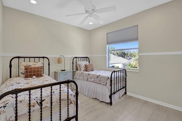 bedroom featuring baseboards, recessed lighting, and a ceiling fan