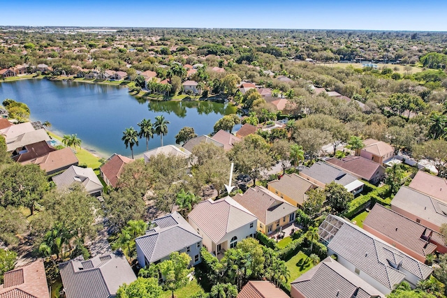 birds eye view of property featuring a residential view and a water view
