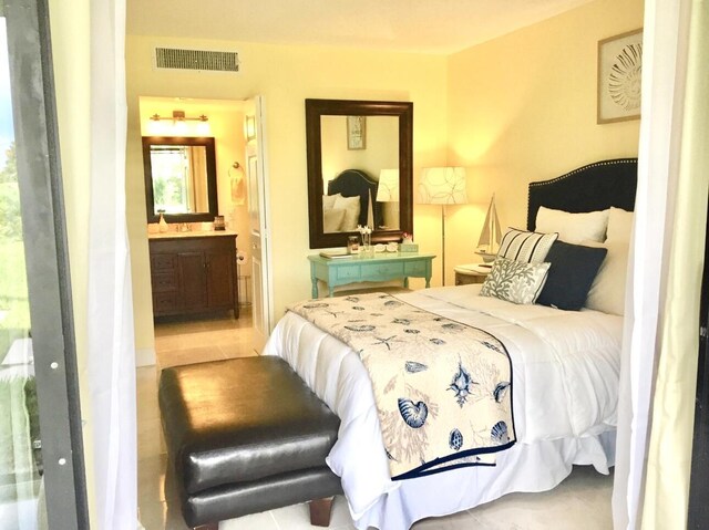 1705 Presidential Way N Unit B101, West Palm Beach, FL 33401 - bedroom with ensuite bathroom