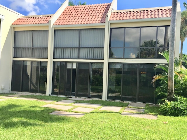 community pool with a patio and fence