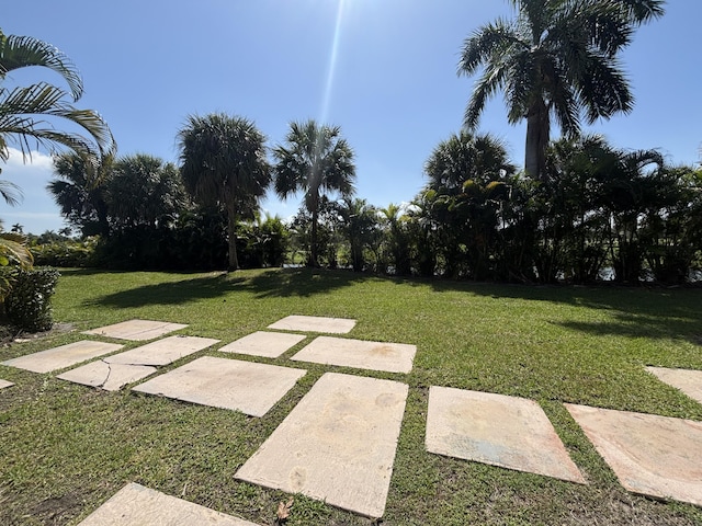 community pool featuring a patio area and fence