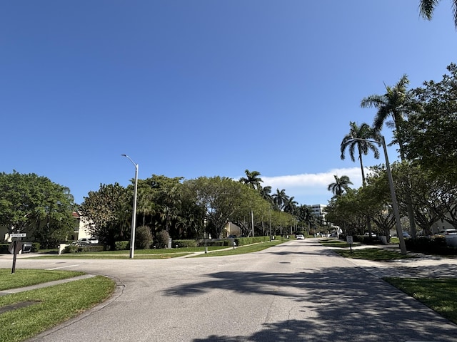 1705 Presidential Way N Unit B101, West Palm Beach, FL 33401 - view of asphalt road with street lighting