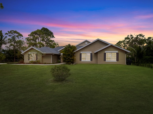 17411 N 40th Run, Loxahatchee, FL 33470 - single story home with stucco siding and a yard