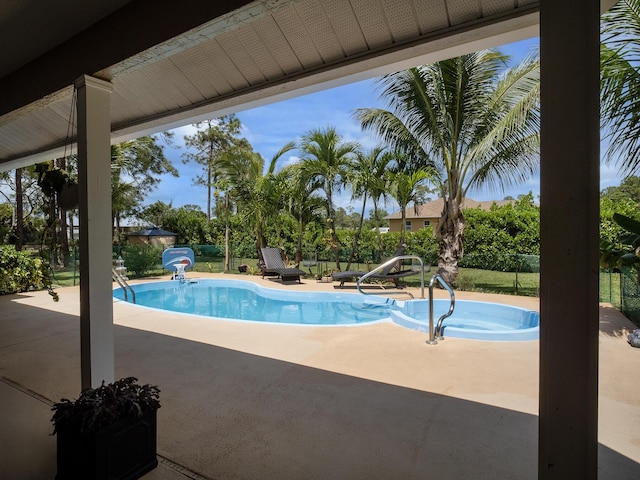 17411 N 40th Run, Loxahatchee, FL 33470 - swimming pool with a patio area