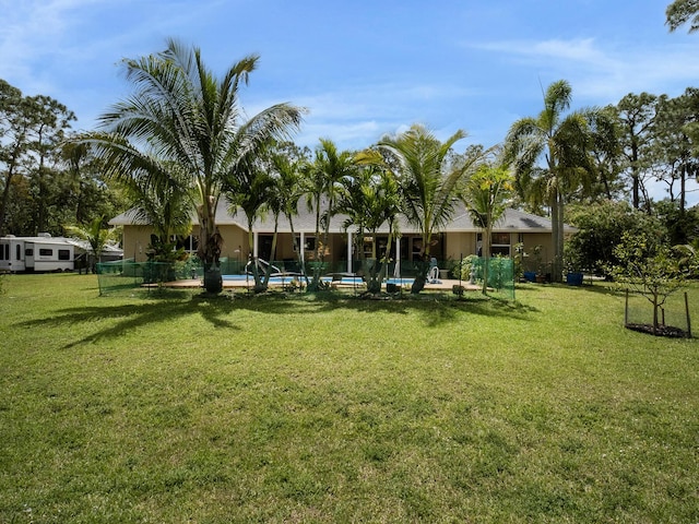 17411 N 40th Run, Loxahatchee, FL 33470 - view of green lawn featuring an outdoor pool