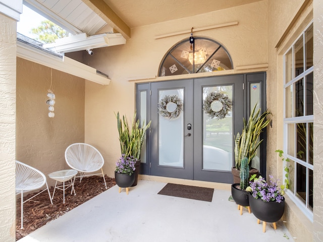 17411 N 40th Run, Loxahatchee, FL 33470 - property entrance featuring french doors and stucco siding