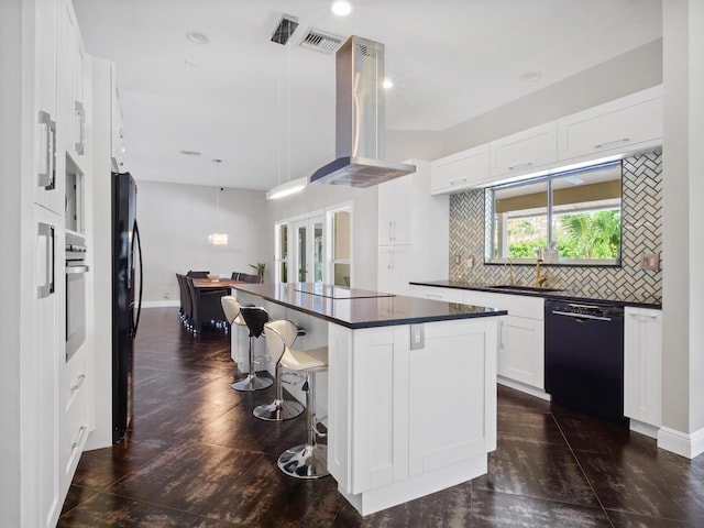17411 N 40th Run, Loxahatchee, FL 33470 - kitchen featuring black appliances, island range hood, dark countertops, a sink, and decorative backsplash