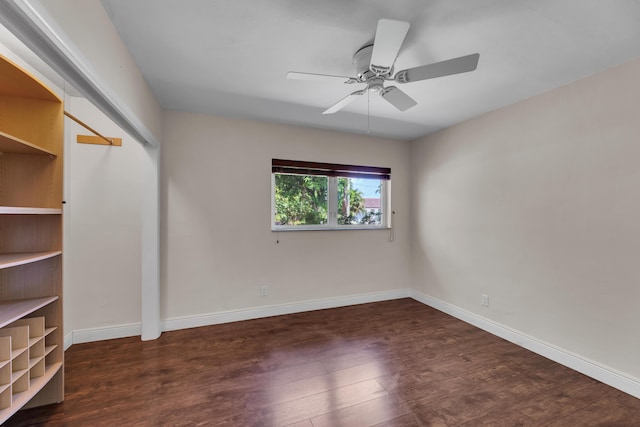 unfurnished bedroom featuring baseboards, ceiling fan, and wood finished floors
