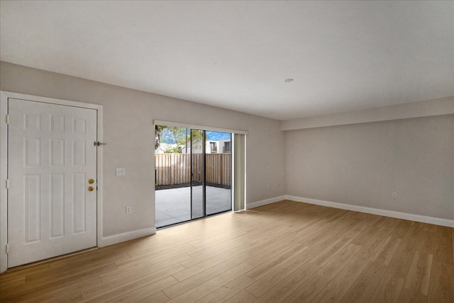 6201 62nd Way, West Palm Beach, FL 33409 - spare room featuring wood finished floors and baseboards