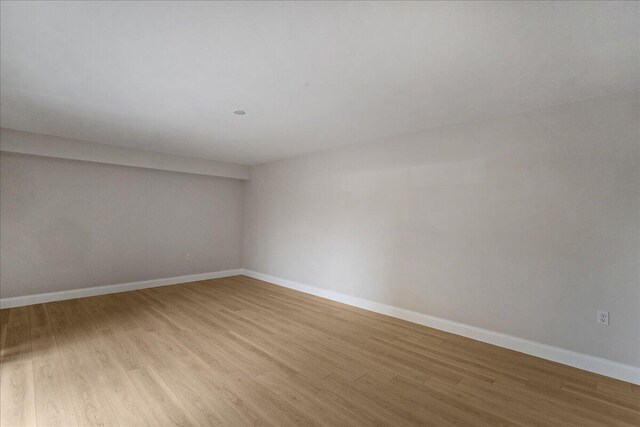 6201 62nd Way, West Palm Beach, FL 33409 - spare room with light wood-style flooring and baseboards
