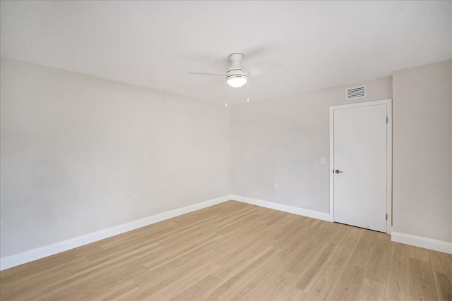 6201 62nd Way, West Palm Beach, FL 33409 - spare room with light wood-type flooring, baseboards, and a ceiling fan