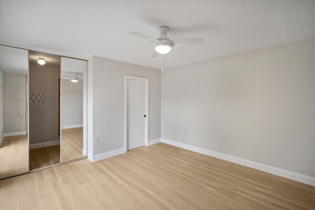 6201 62nd Way, West Palm Beach, FL 33409 - unfurnished bedroom with light wood-style flooring, baseboards, and ceiling fan