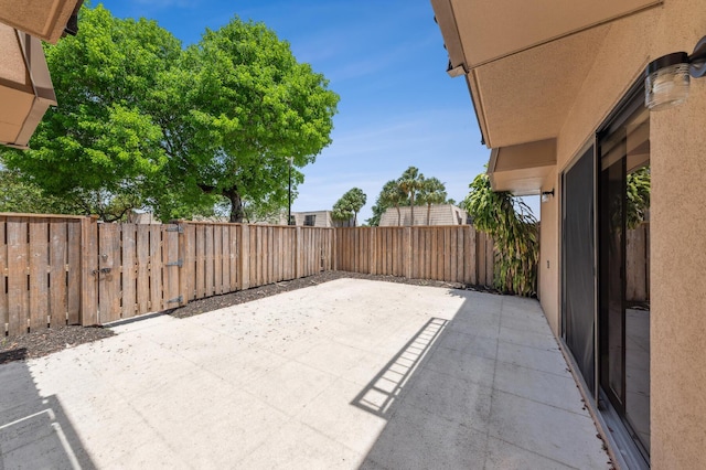 6201 62nd Way, West Palm Beach, FL 33409 - fenced backyard featuring a patio