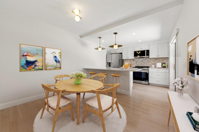 6201 62nd Way, West Palm Beach, FL 33409 - dining area with light wood-style floors, baseboards, and recessed lighting