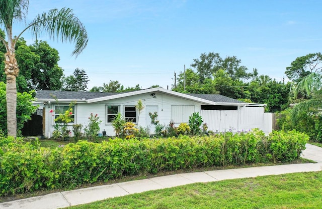 120 Banyan Dr, Port Saint Lucie, FL 34952 - ranch-style home featuring a front yard