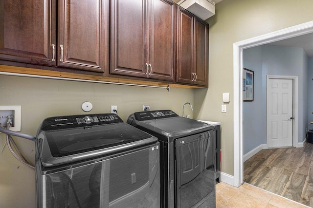 21281 Waycross Dr, Boca Raton, FL 33428 - washroom with washer and dryer, cabinet space, and baseboards