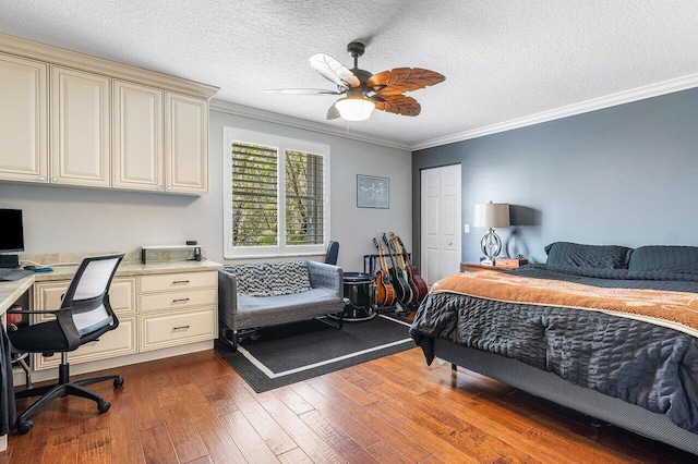 21281 Waycross Dr, Boca Raton, FL 33428 - bedroom with hardwood / wood-style floors, crown molding, a textured ceiling, and a ceiling fan