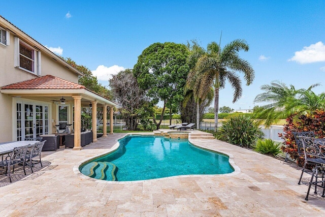 21281 Waycross Dr, Boca Raton, FL 33428 - view of pool featuring a patio area, a fenced backyard, ceiling fan, and a pool with connected hot tub