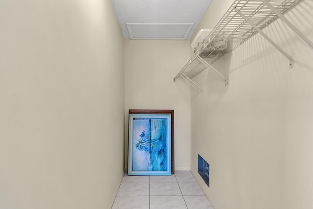 155 Mockingbird Ln, Delray Beach, FL 33445 - walk in closet with marble finish floor and visible vents