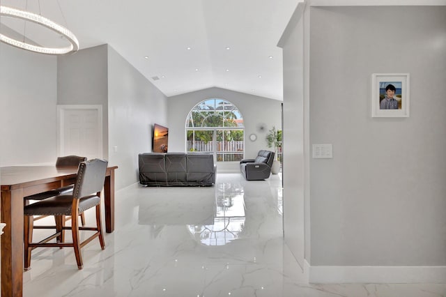 living room with marble finish floor, baseboards, vaulted ceiling, and recessed lighting