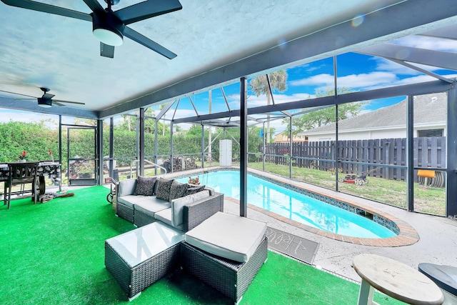 3750 NW 73rd Way, Coral Springs, FL 33065 - view of swimming pool featuring ceiling fan, a patio area, glass enclosure, and an outdoor living space