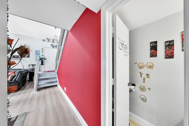 3750 NW 73rd Way, Coral Springs, FL 33065 - hallway with light wood-style flooring and baseboards