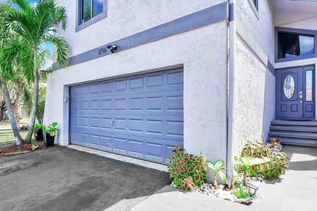 3750 NW 73rd Way, Coral Springs, FL 33065 - garage featuring driveway