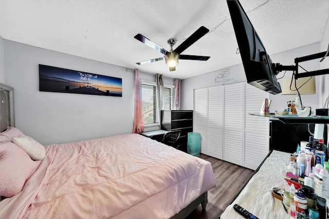 3750 NW 73rd Way, Coral Springs, FL 33065 - bedroom with wood finished floors, a textured ceiling, ceiling fan, and a closet