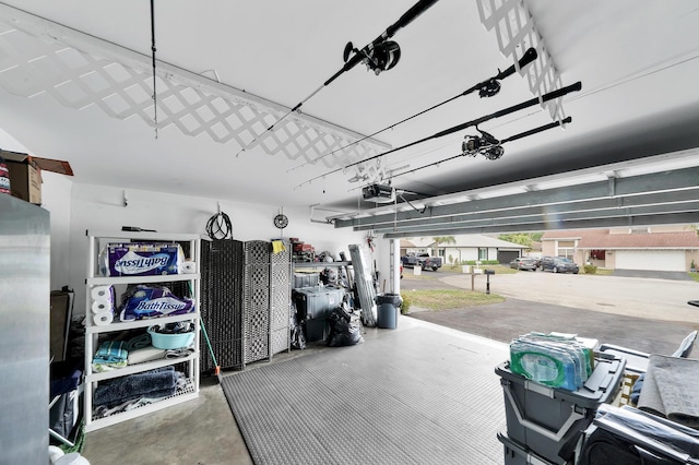 3750 NW 73rd Way, Coral Springs, FL 33065 - garage featuring a garage door opener