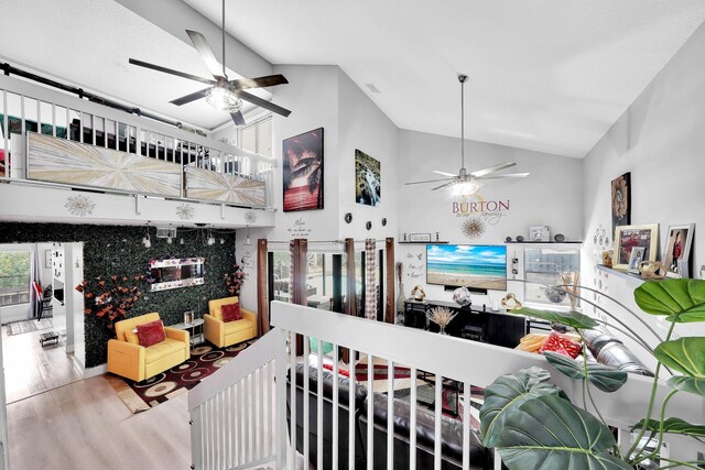 3750 NW 73rd Way, Coral Springs, FL 33065 - living area featuring ceiling fan, wood finished floors, and high vaulted ceiling