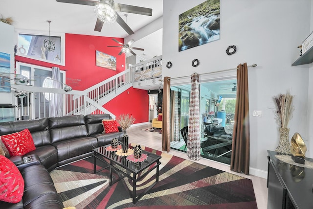3750 NW 73rd Way, Coral Springs, FL 33065 - living area featuring high vaulted ceiling, ceiling fan, stairs, and baseboards